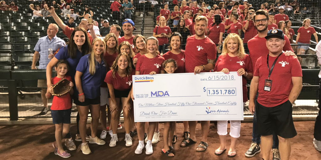 Brant (fourth from right) and the Boersma family with last year's Drink One for Dane Day donation to MDA.