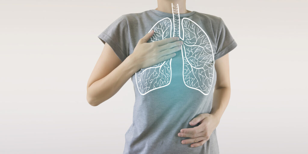 highlighted blue  healthy lungs on woman body