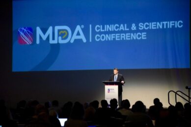 Donald S. Wood, PhD, MDA President and CEO on stage at the MDA Clinical & Scientific Conference
