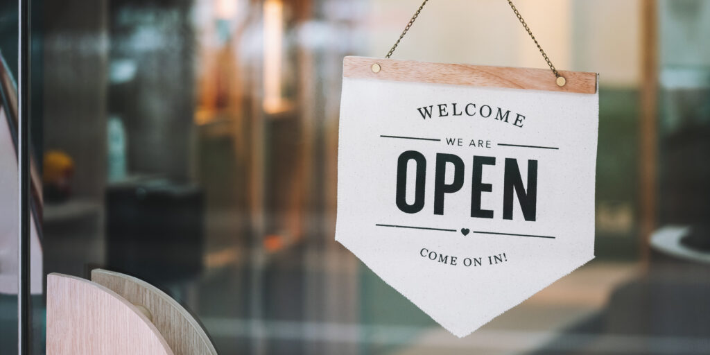 Open sign on Door entrance of retail store