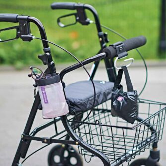 Think King Soft Buggy Cup attached to a rollator