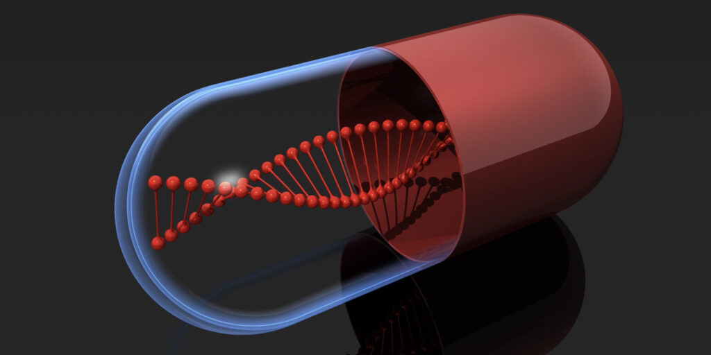 DNA spiral pill on black background. Genetically modified food concept.