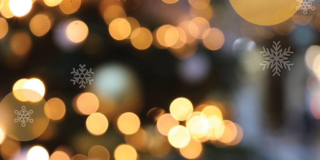 Closeup of twinkling lights and snowflakes