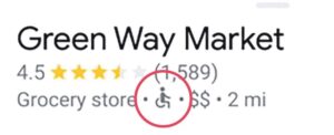 A photo of a Google map entry that says “Green Way Market” with a small wheelchair next to the name. 