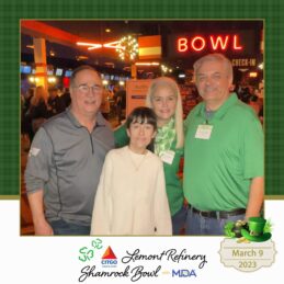 A Shamrock Bowl border is around a photo of two men and two women in a bowling alley