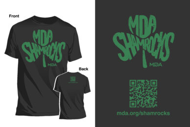 A black T-shirt with a green MDA Shamrocks logo