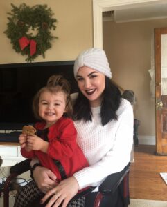 Cassidy Nilles holding her toddler, Capri