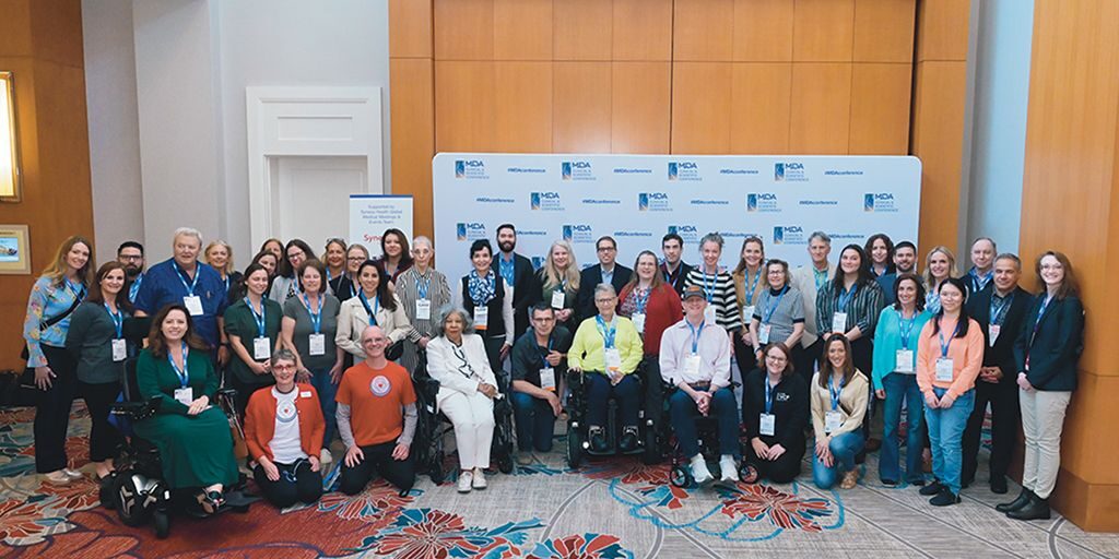 A group of people from neuromuscular advocacy organizations gathered at the 2024 MDA Clinical & Scientific Conference.