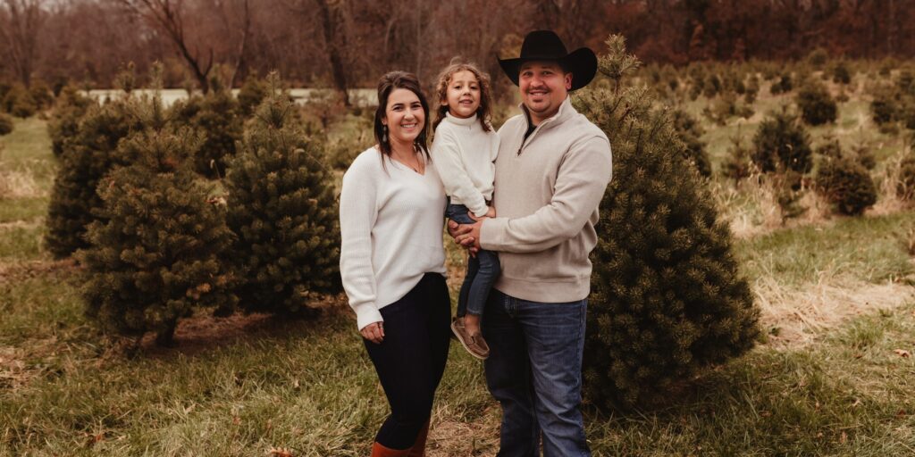 Parents hold their four-year-old daughter, who received Zolgensma for spinal muscular atrophy as an infant.