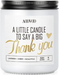 A white jar candle with a label that says, "A little candle to say a big thank you"