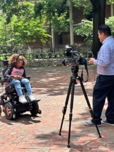 Gabrielle speaking to a local news station about her advocacy on campus. 