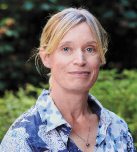 Headshot of researcher Marjan Huizing, a woman with blond hair in a ponytail and light skin.