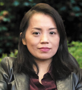 Headshot of researcher May Malicdan, an Asian woman with straight, shoulder-length black hair and light skin.