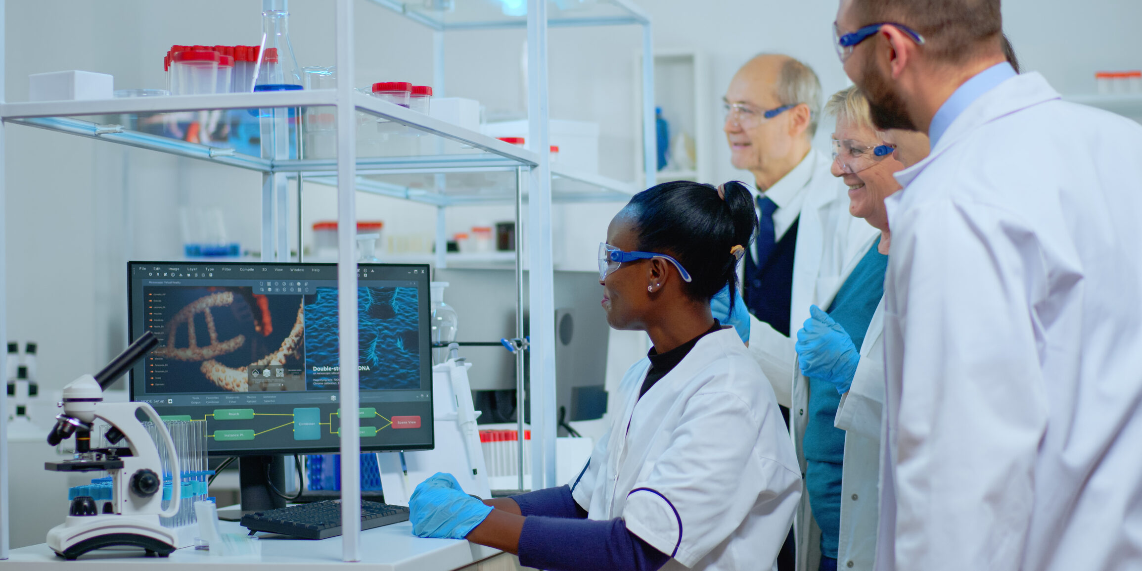 Young black woman scientist doing medical research in modern equipped lab. Multiethnic team examining virus evolution using high tech for scientific analysis of treatment development