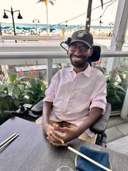 Ira Walker enjoying a open beach cafe.