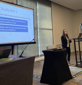 Me giving a research presentation at a conference