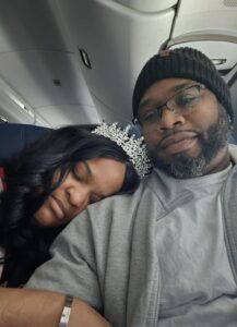 Jonathan and Tamara traveling to an event on-board a flight to LA
