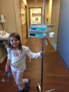 Courtney B. in the hospital getting long treatments