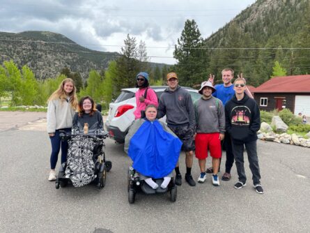 A group of MDA Summer Camp campers and counselors outside