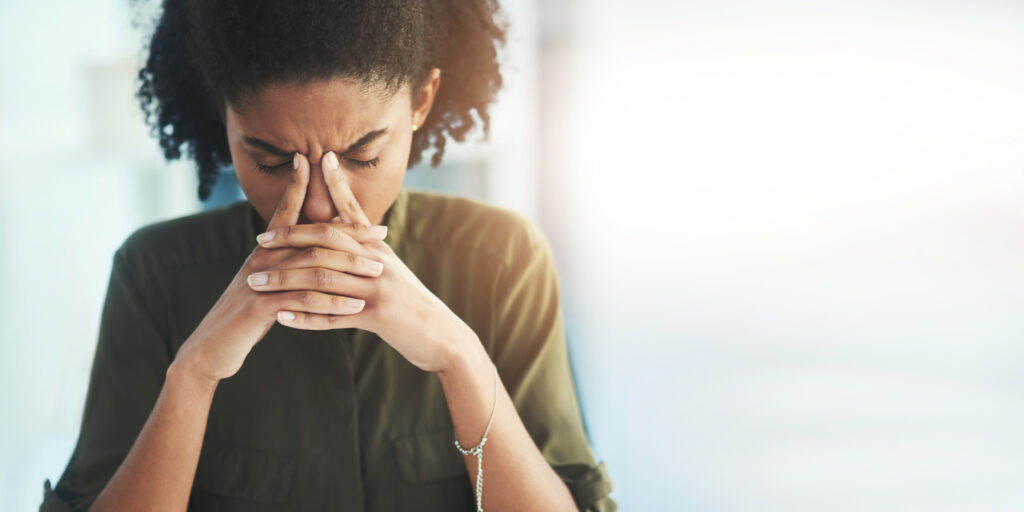 Mockup, business and black woman with stress, depression and mental health with burnout, overworked and deadline. Corporate, female employee and leader with headache, anxiety and schedule in office