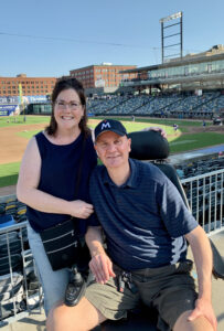Jon and wife at another game.