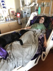 Jewel comforting Lyza during a hospital stay.