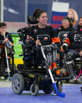 Michele Boardman playing power hockey