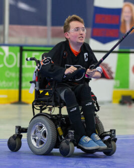 Liam Miller playing power hockey