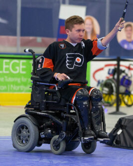 A shot of Jake Saxton playing power hockey