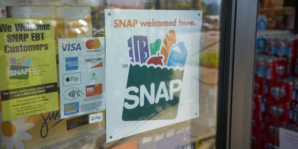 Portland, OR, USA - Oct 28, 2020: "SNAP welcomed here" sign is seen at the entrance to a Big Lots store in Portland, Oregon. The Supplemental Nutrition Assistance Program (SNAP) is a federal program.