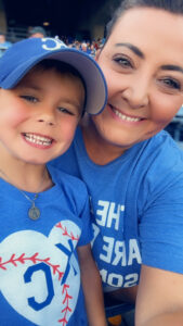 Danny and I cheering on our KC Royals this past summer. He's Bobby Witt Jr.'s biggest fan!