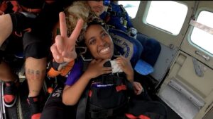 Gabrielle on a plane as she prepared to go skydiving, a dream she had since she was 10 years old.