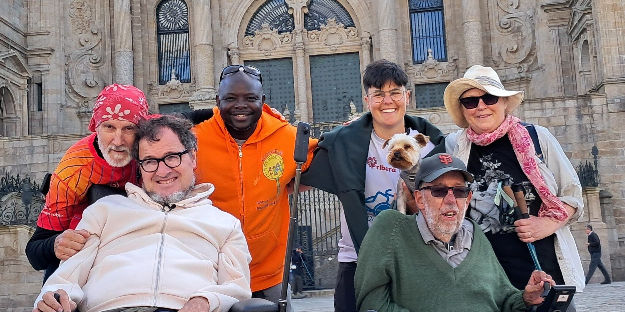 A group poses in front of the cathedral in Santiago, Spain