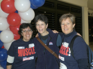 Leslie with two friends at an MDA "Walk and Roll"