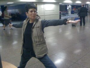 Leslie practicing yoga