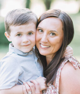 Closeup of Jessica Hubbard embracing her son, Deacon.