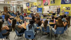 Callie Hall leads a classroom discussion on the history of the Disability Rights Movement.
