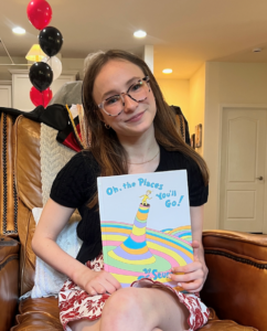 All-the-Places-Youll-Go-a-book-signed-by-all-of-her-K-12-teachers-with-well-wishes-for-the-future