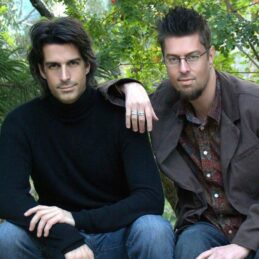 Tow young men pose together