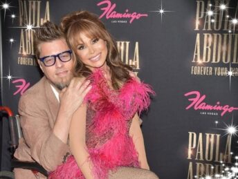 Donnie Demers in wheelchair hugs Paula Abdul