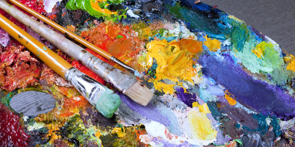 artist's palette, texture mixed oil paints in different colors and saturation studio