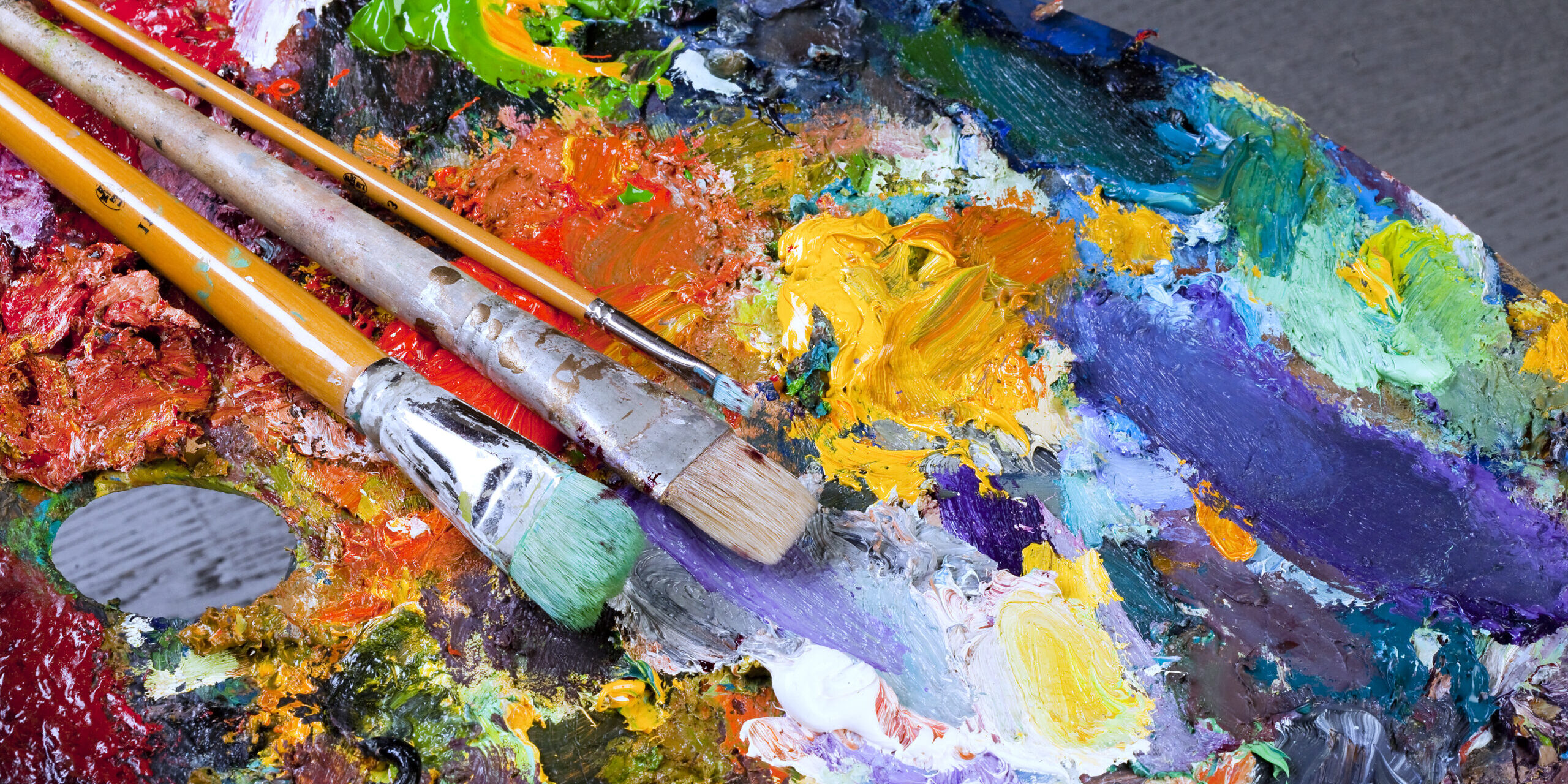 artist's palette, texture mixed oil paints in different colors and saturation studio